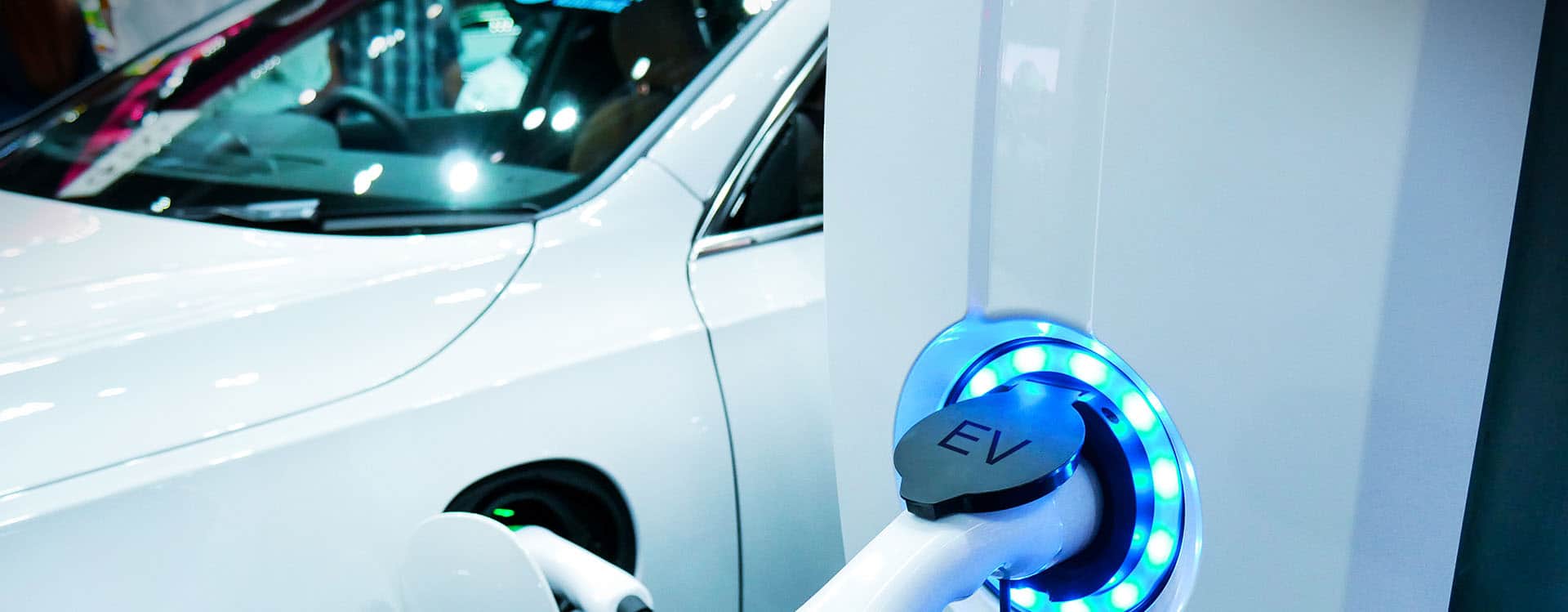 Power Supply Connect To Electric Vehicle For Charge To The Battery. Charging Technology Industry Transport Which Are The Futuristic Of The Automobile.ev Fuel Plug In Hybrid Car.