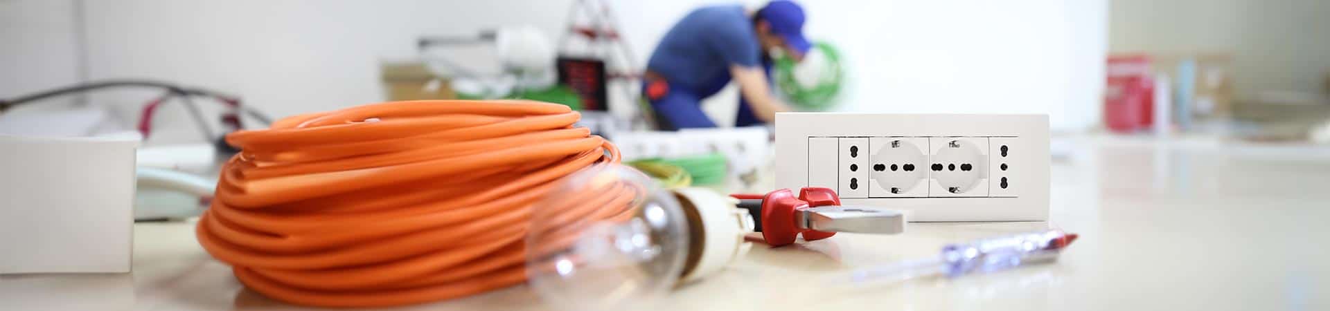 Cables And Electrician In Background