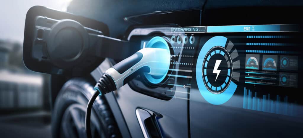 Electric vehicle charging with holographic status indicator.