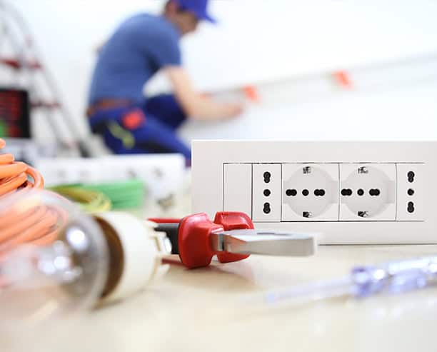 Electrician Working Wall Socket Tools